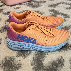 Hoka Vibrant Orange and Baby Blue/Purple Sneakers
